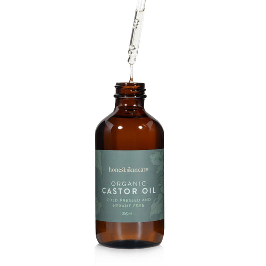 Organic Castor Oil in a glass bottle with pipette - cold pressed and hexane-free.