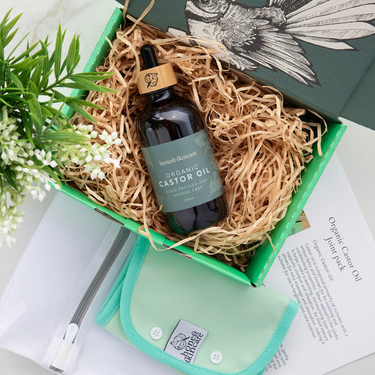 Castor Oil for Inflammation organic kit, featuring a bottle and joint wrap, ideal for sore joints.