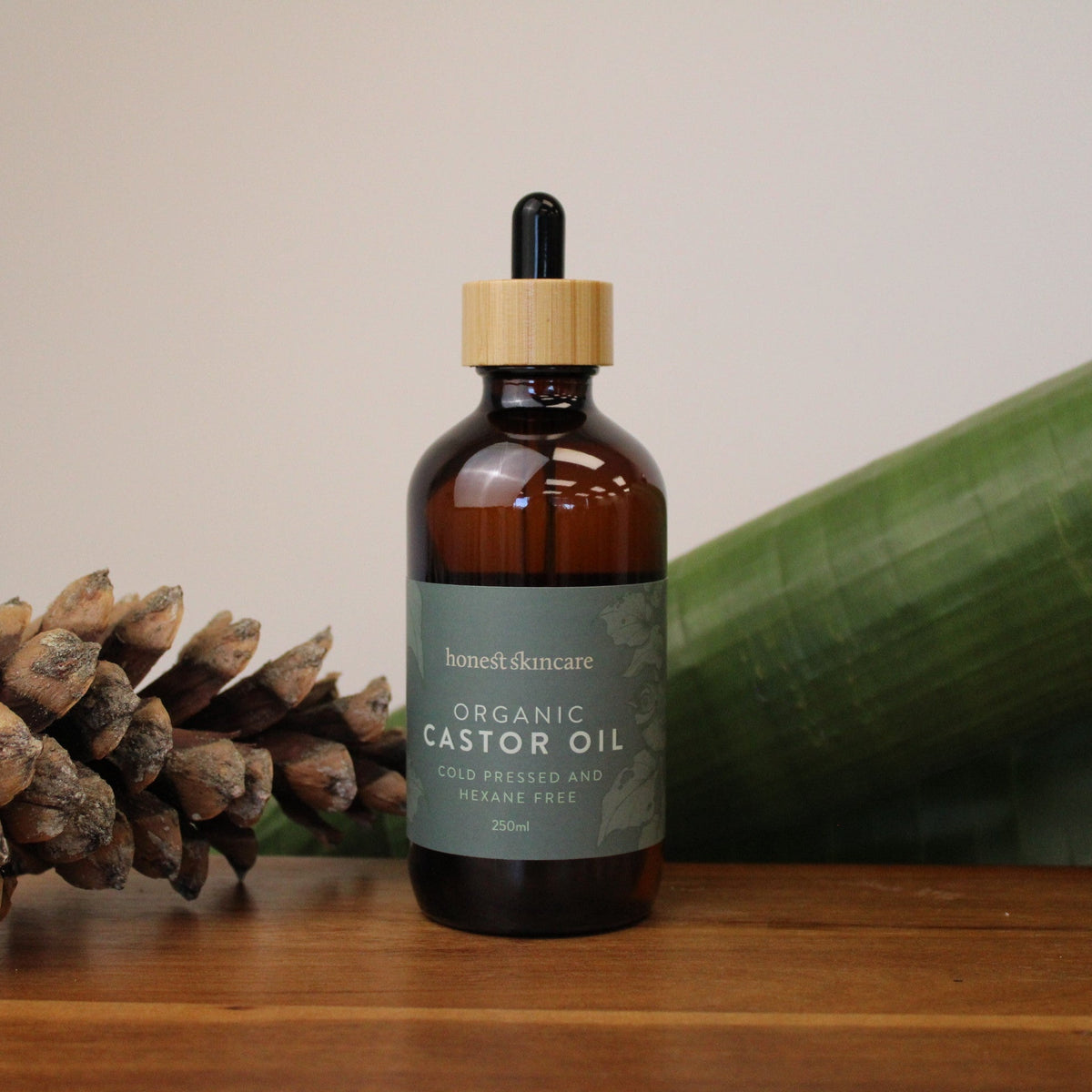 Organic Castor Oil in a glass bottle, cold pressed and hexane free, ideal for skin and hair care.