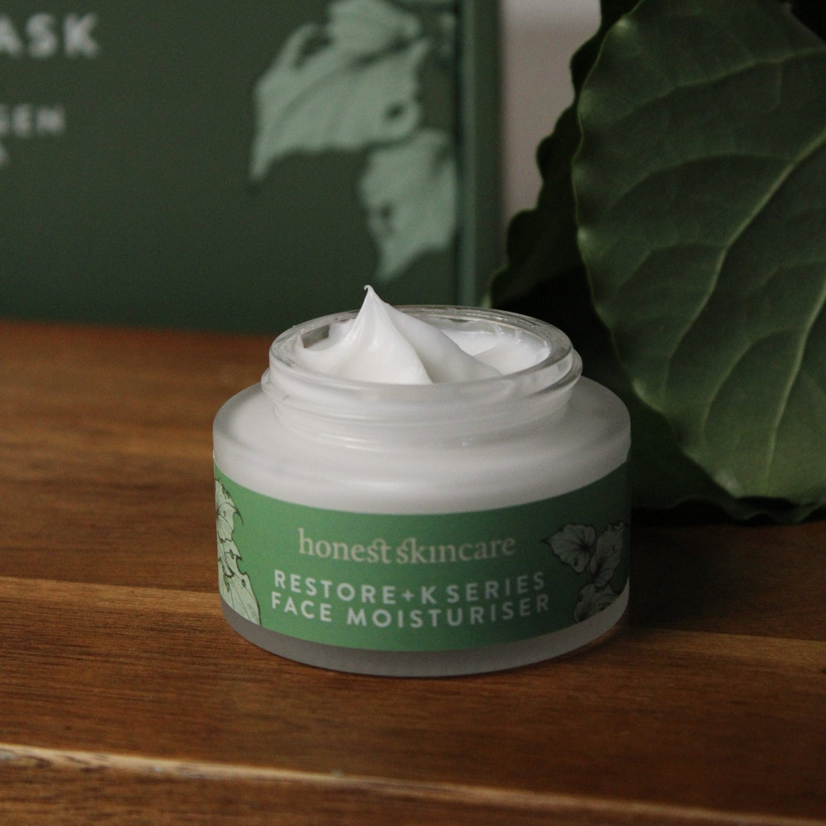Restore+ K Series hydrating facial cream in a jar, offering rich moisture and nourishment for glowing skin.