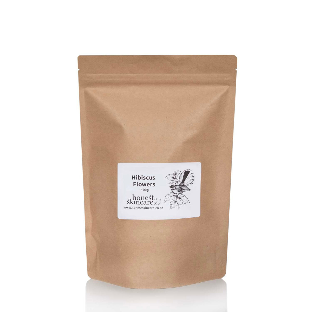 Brown package with a label on a white background dried hibiscus tea honest skincare