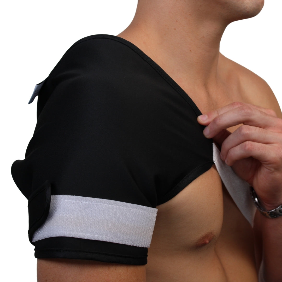 Person wearing an Organic Castor Oil Shoulder Wrap for soothing comfort and natural wellness.