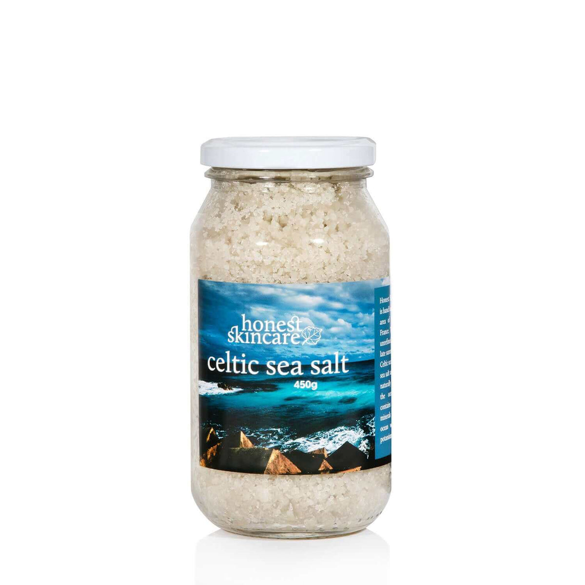 Jar of celtic sea salt with 'honest skincare' label on a white background