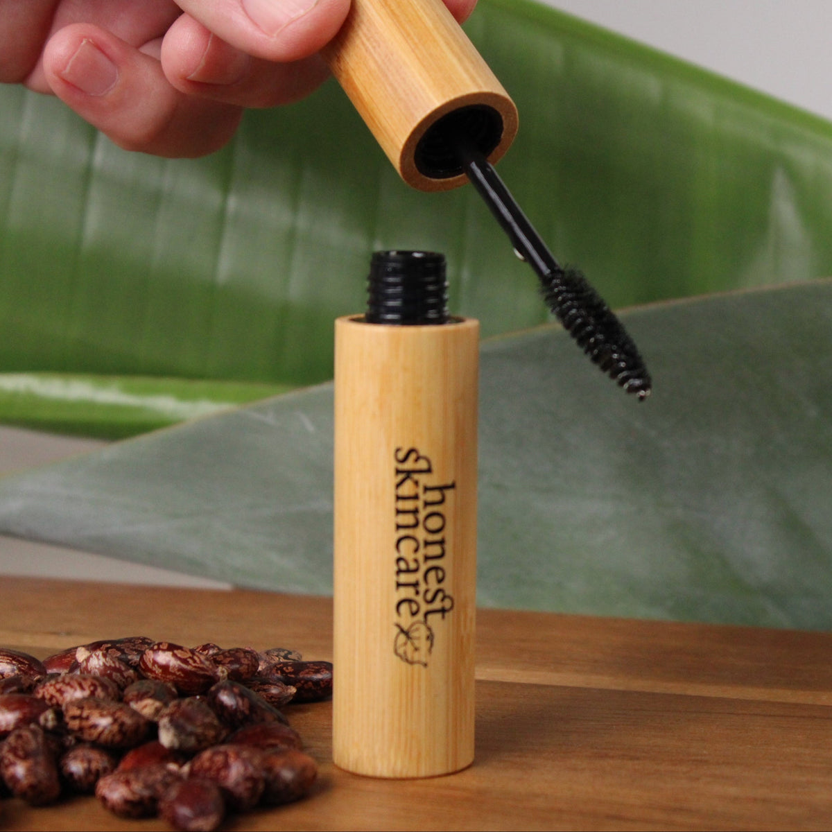 Castor oil for eyelashes in a bamboo applicator for fuller, thicker lashes and brows.