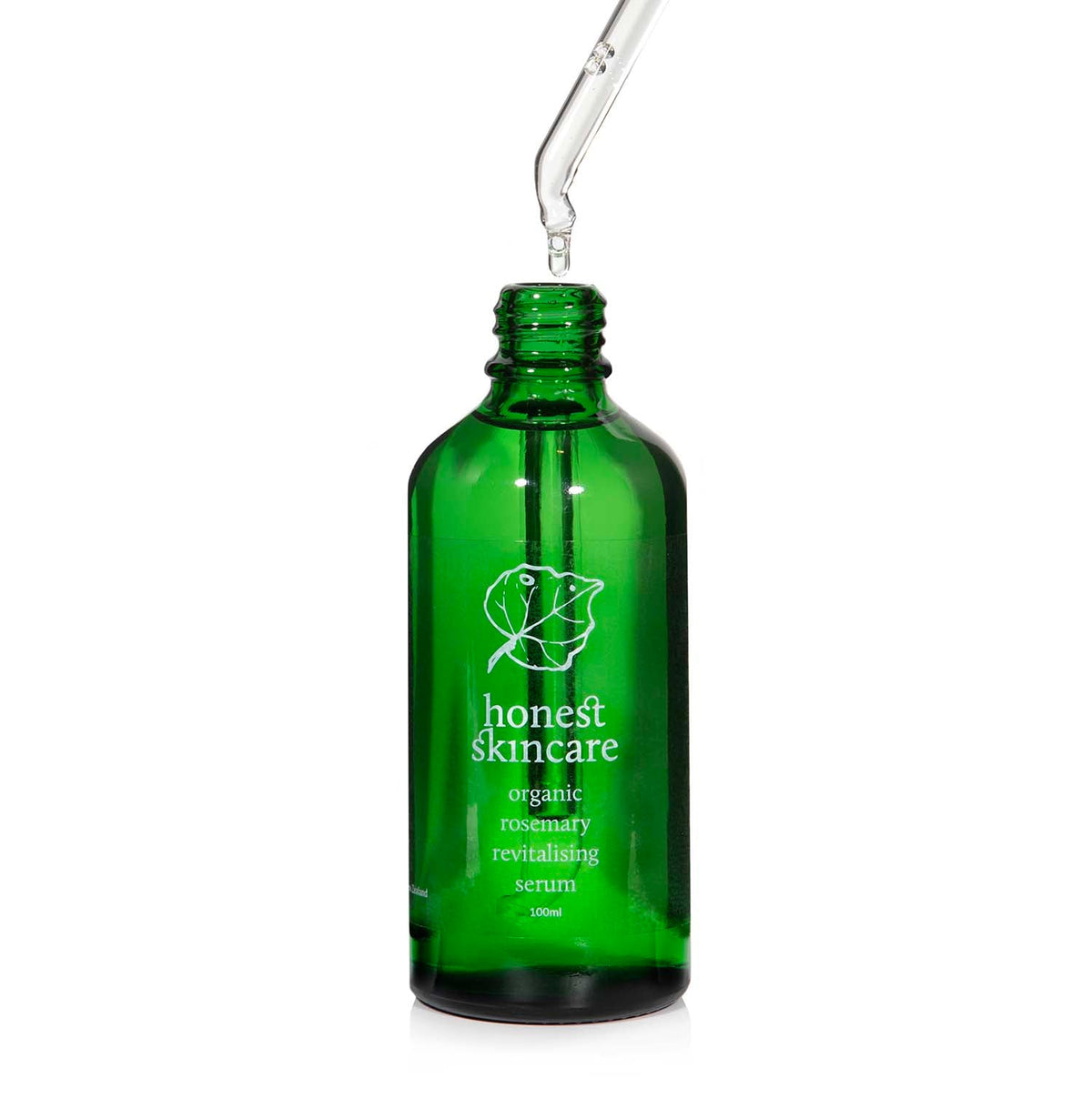 Rosemary oil for hair serum in a green glass bottle with dropper, promoting natural hair care.